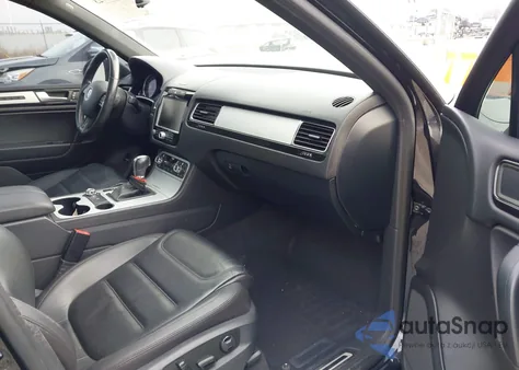 2014 Volkswagen Touareg 3.6L R-Line z USA, uszkodzony, nr VIN WVGDF9BP2ED002584